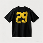 Vintage-style oversized drop-shoulder T-shirt featuring a large "29" back print with distressed, worn-effect typography; crafted from 100% cotton—a casual top with an American street-style vintage aesthetic.