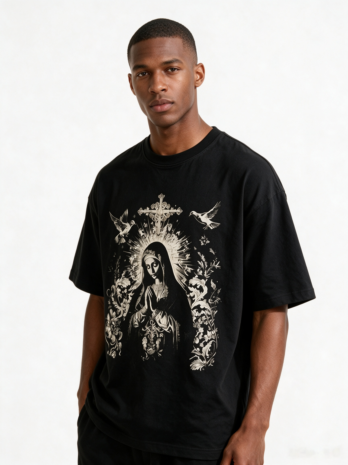 Vintage-style short-sleeve T-shirt featuring Madonna, cross, and dove prints; heavyweight pure cotton, oversized fit; dark high-street art aesthetic.
