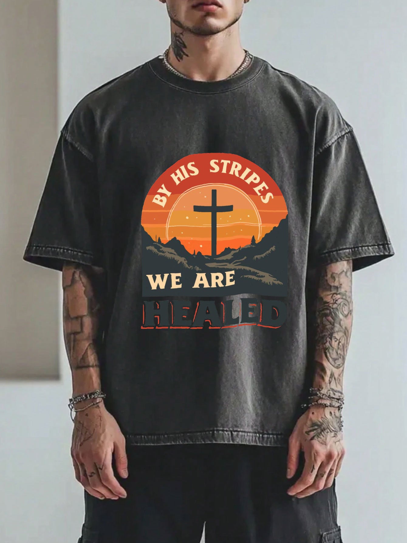 Local Delivery Vintage Loose, Washed Black Cross Sunset Print Pattern with Text 'Because of His Scourge We Are Healed', Suitable for Everyday Casual Scenes. Street Style, Weekend Outfit, Unique Shirt, Graphic, Breathable Material, Comfortable