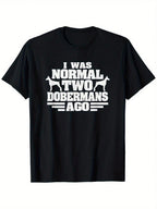 Funny 'I Was Normal 2 Dobermans Ago' Dog DadMom T-Shirt - 100% Cotton, Black Short Sleeve, Round Neck, Unique Print Design, Perfect Gift For Pet Lovers, S-XXXL, Machine Washable, Soft & Breathable Fabric, Humorous Apparel Playful Print 100% Cotton Shirt,S