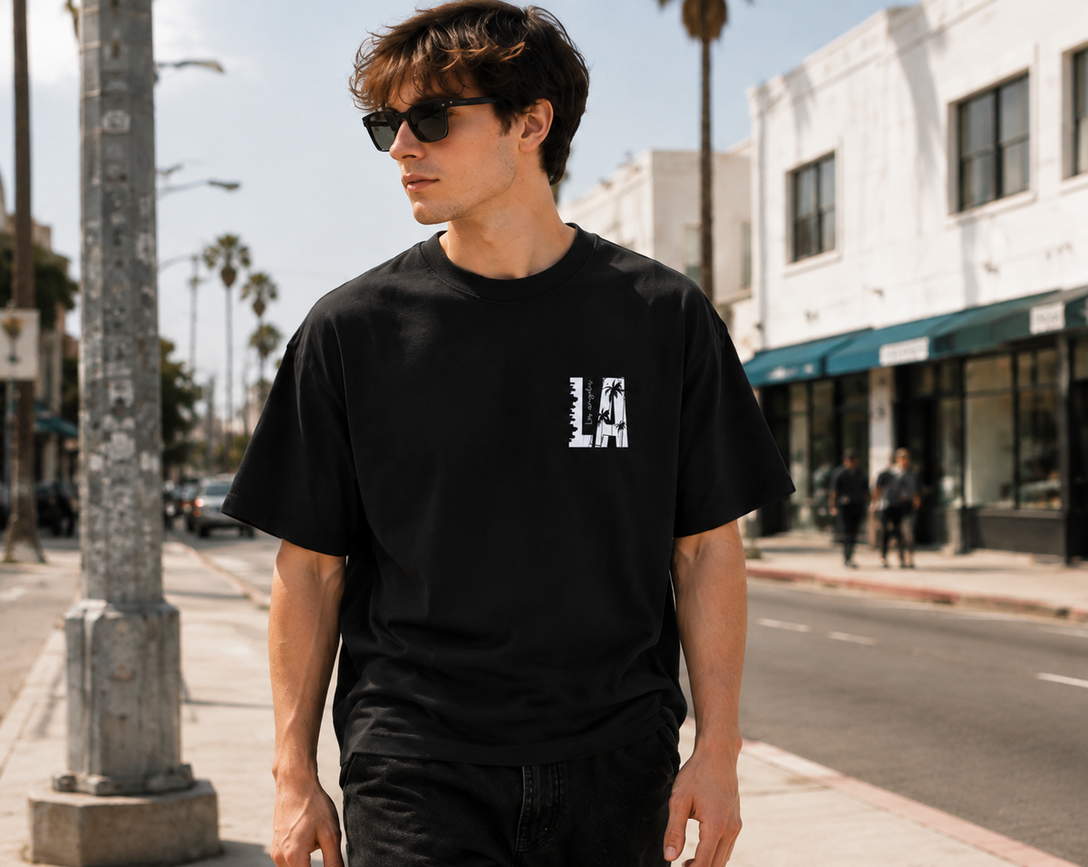 LA-themed double-sided print T-shirt with a vintage washed finish; heavyweight pure cotton, oversized loose fit; American urban streetwear style.