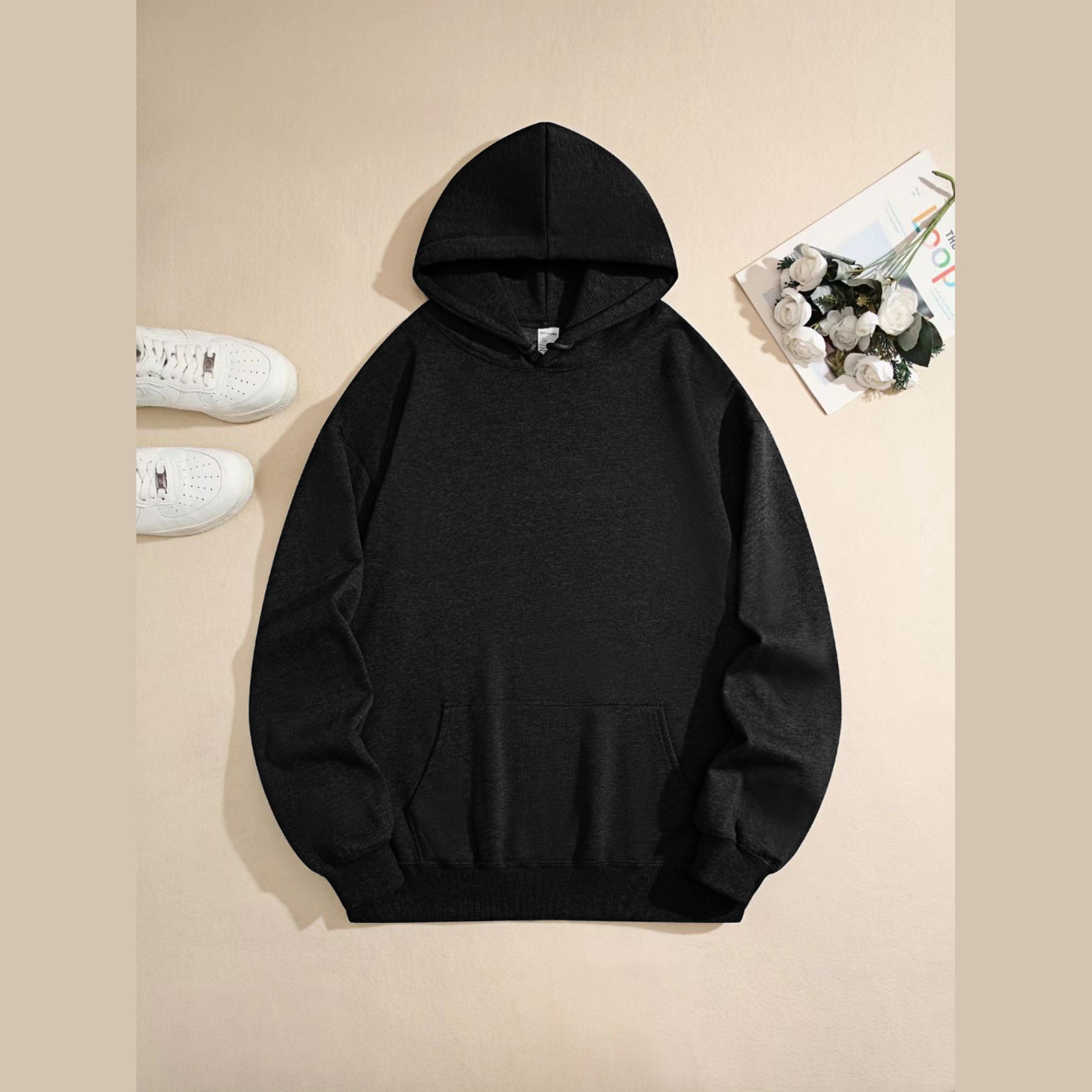 Unisex heavyweight hooded sweatshirt; breathable cotton blend; casual top suitable for couples.