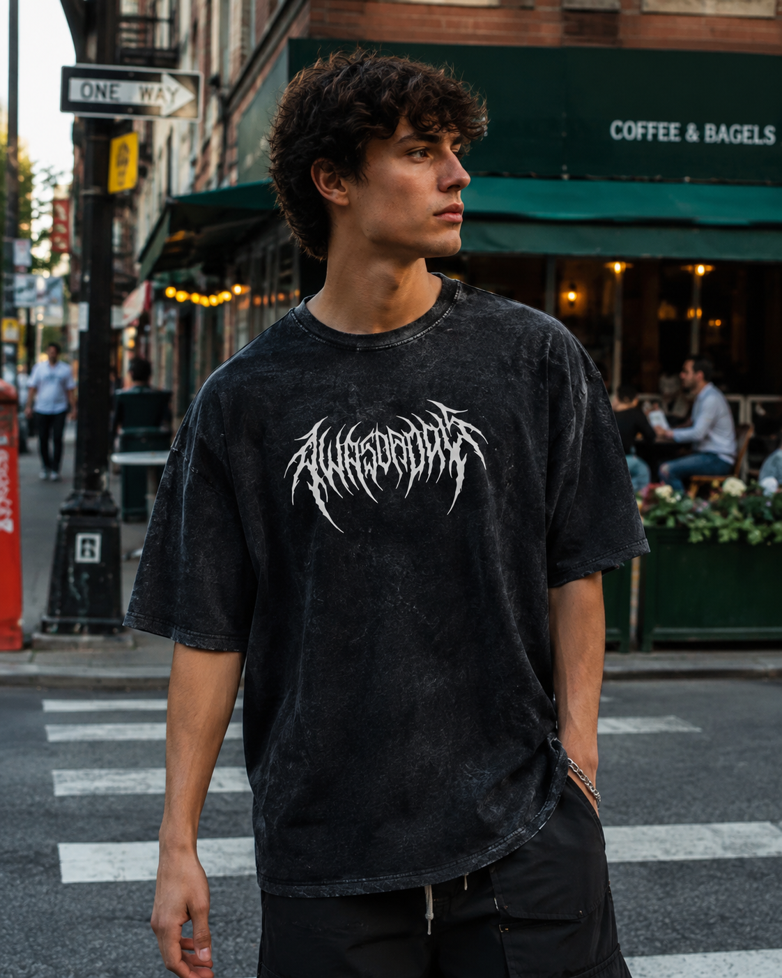 Vintage-wash black T-shirt featuring double-sided prints of a fallen archangel with a thorn halo; dark, heavy metal, and gothic style; loose-fitting short-sleeve unisex design.