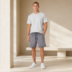 American vintage-style "dirty wash" shorts; distressed, faded, cotton-feel athletic shorts; versatile, casual unisex style.