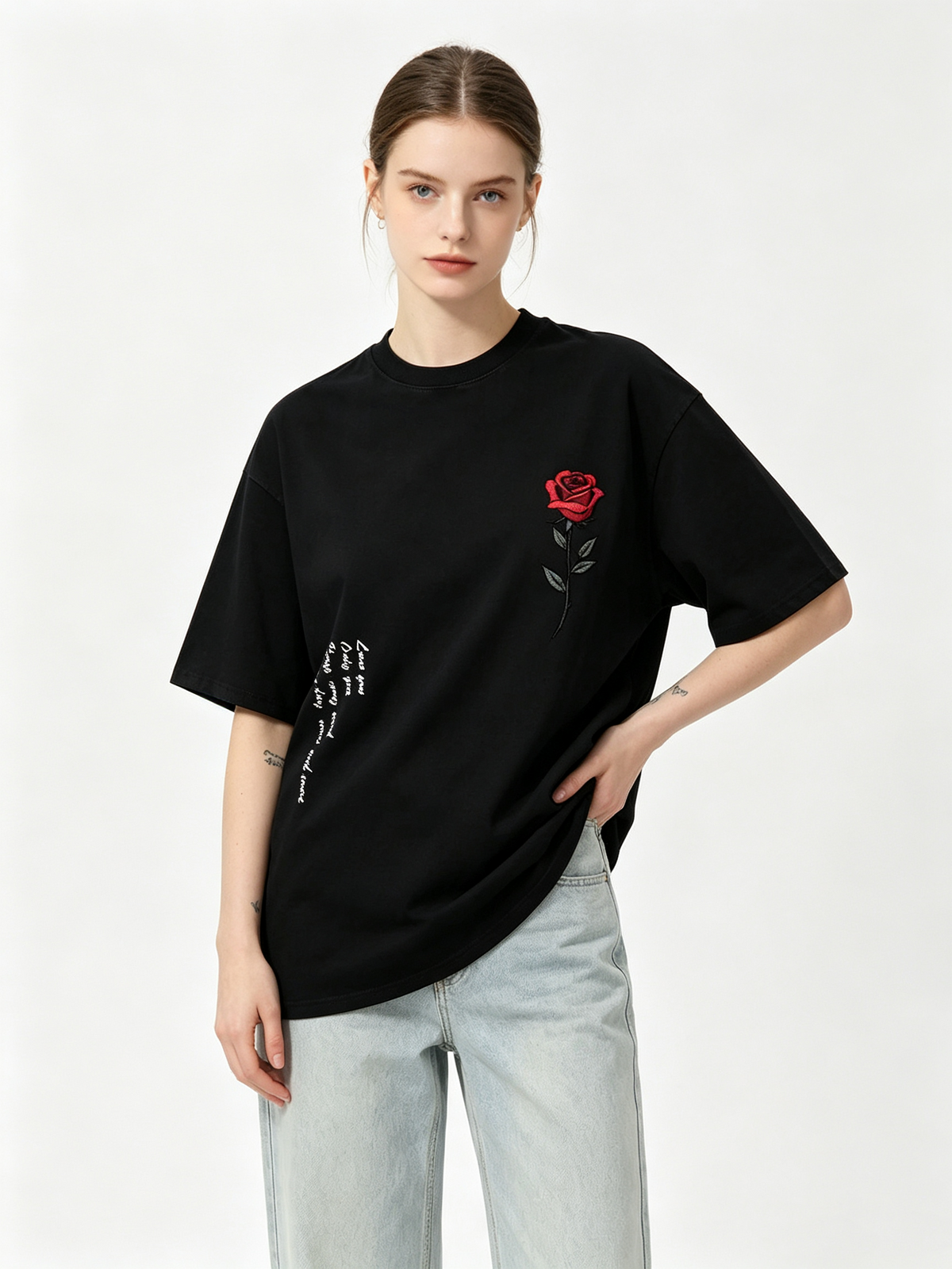 Women's Oversized Vintage-Style Washed Cotton T-Shirt – Featuring Red Rose Embroidery, Handwritten English Lettering on the Side, and an American Retro Aesthetic.