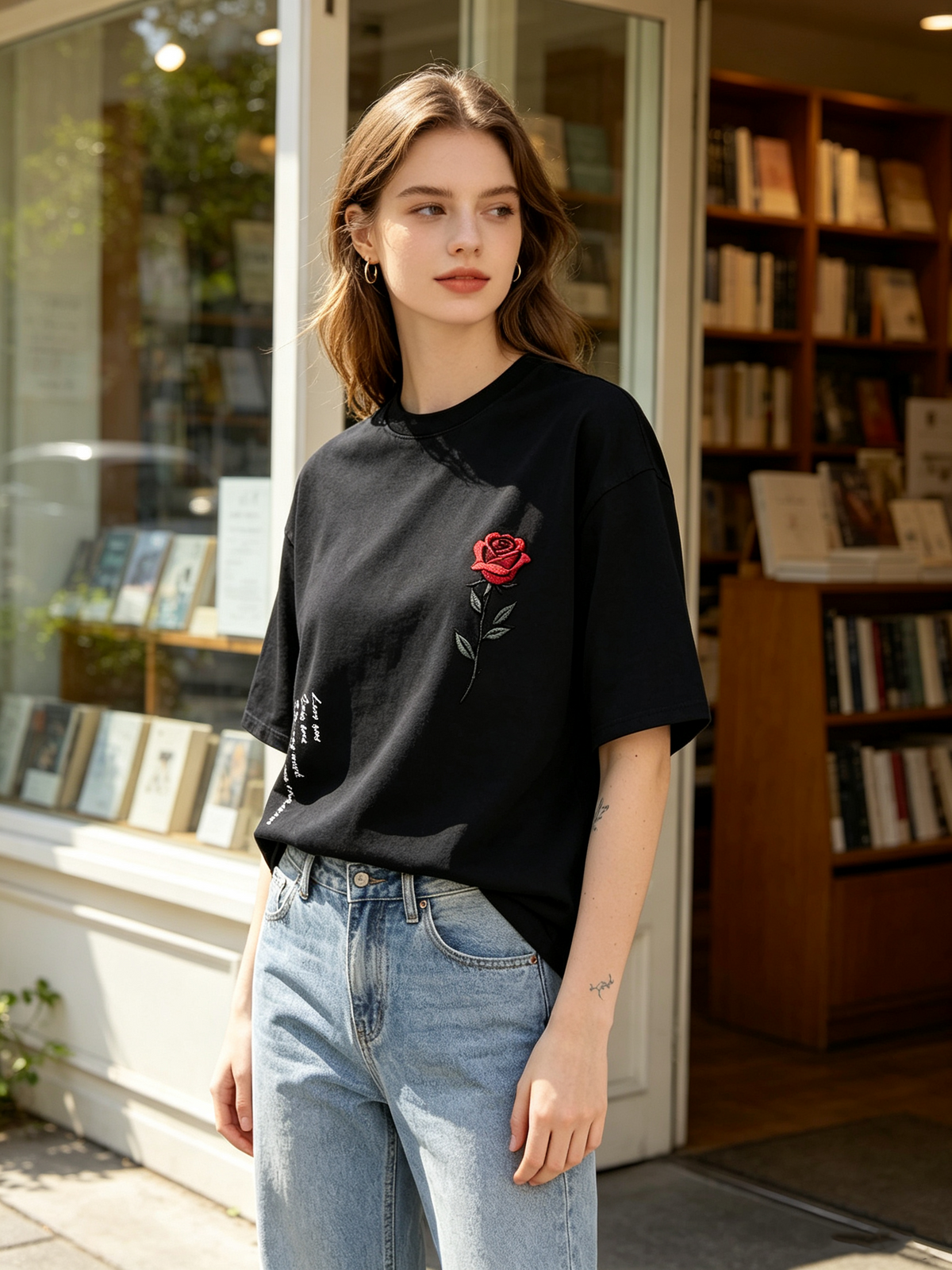 Women's Oversized Vintage-Style Washed Cotton T-Shirt – Featuring Red Rose Embroidery, Handwritten English Lettering on the Side, and an American Retro Aesthetic.
