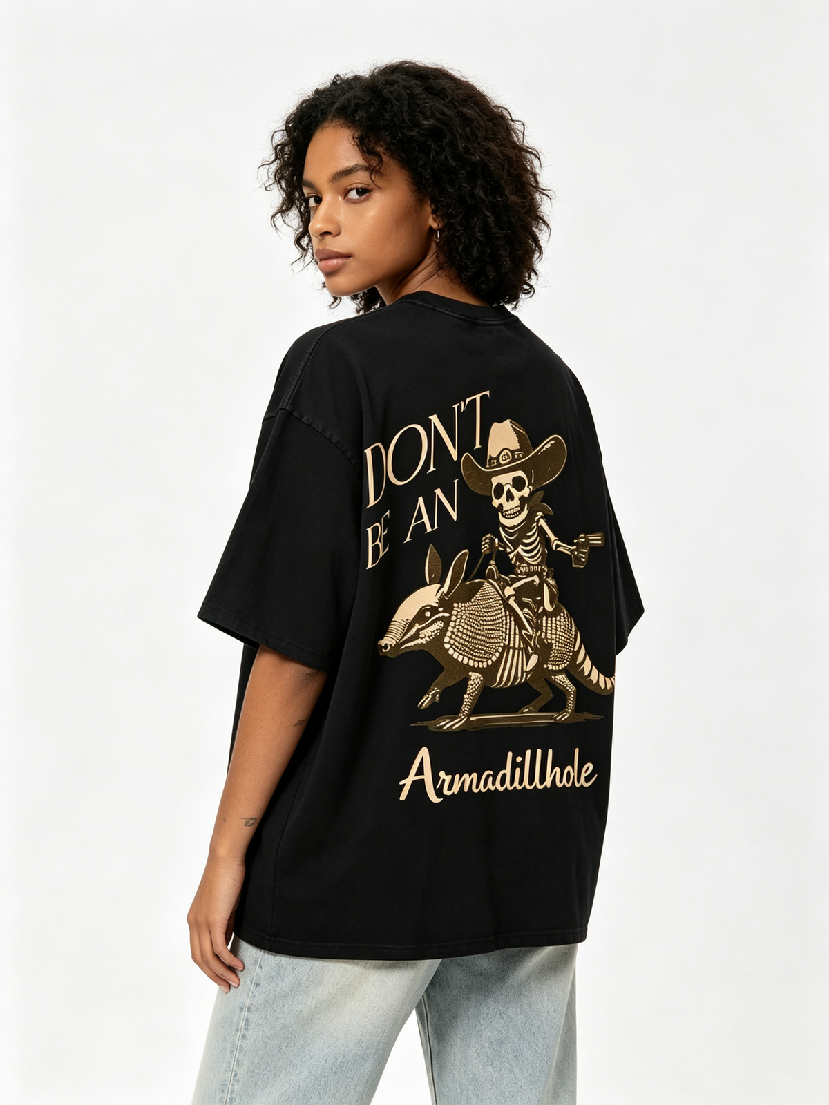Oversized Unisex Cotton T-Shirt Featuring a Western-Style Skeleton Cowboy Riding an Armadillo; Vintage-Style Washed Finish with a Fun, Quirky Graphic Print.