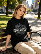 Women's Black All-Cotton T-Shirt – Distressed American Style, Drop-Shoulder Short-Sleeve Top with Subculture-Inspired Fanged Monster Graphic