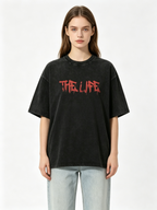 Women's American-style vintage-wash short-sleeve T-shirt; loose, oversized fit featuring a double-sided print of a skull holding a gun.