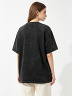 Women's American-style stone-washed distressed T-shirt featuring a distinctive, edgy, dark-aesthetic rose graphic.