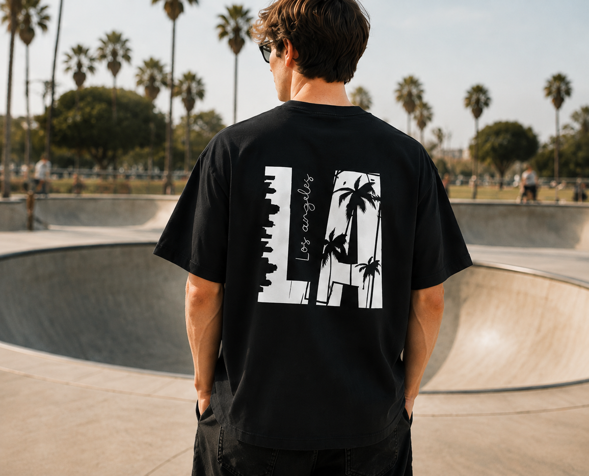 LA-themed double-sided print T-shirt with a vintage washed finish; heavyweight pure cotton, oversized loose fit; American urban streetwear style.