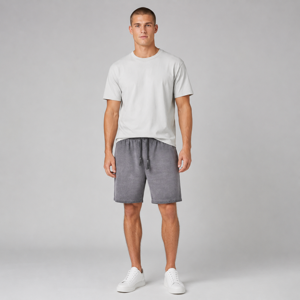 American vintage-style "dirty wash" shorts; distressed, faded, cotton-feel athletic shorts; versatile, casual unisex style.