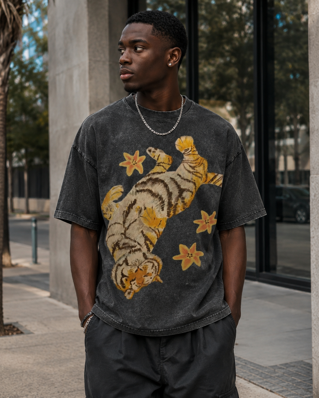 American-style acid-washed distressed, relaxed look with tiger and floral illustrations. Heavyweight vintage wash, oversized, loose fit, unisex T-shirt.