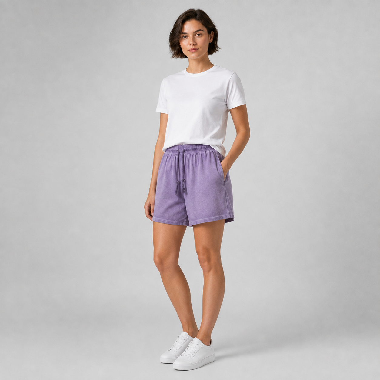 American vintage-style "dirty wash" shorts; distressed, faded, cotton-feel athletic shorts; versatile, casual unisex style.