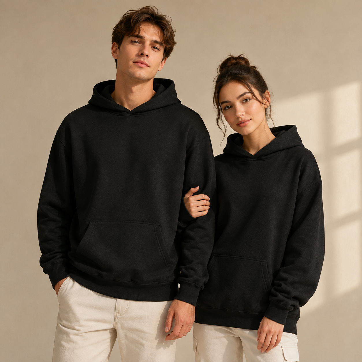 Unisex heavyweight hooded sweatshirt; breathable cotton blend; casual top suitable for couples.