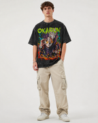 Vintage-wash black T-shirt featuring Okarun (split-personality anime character), flame graffiti, and Y2K/wasteland aesthetic; loose-fit short-sleeve style for men and women.