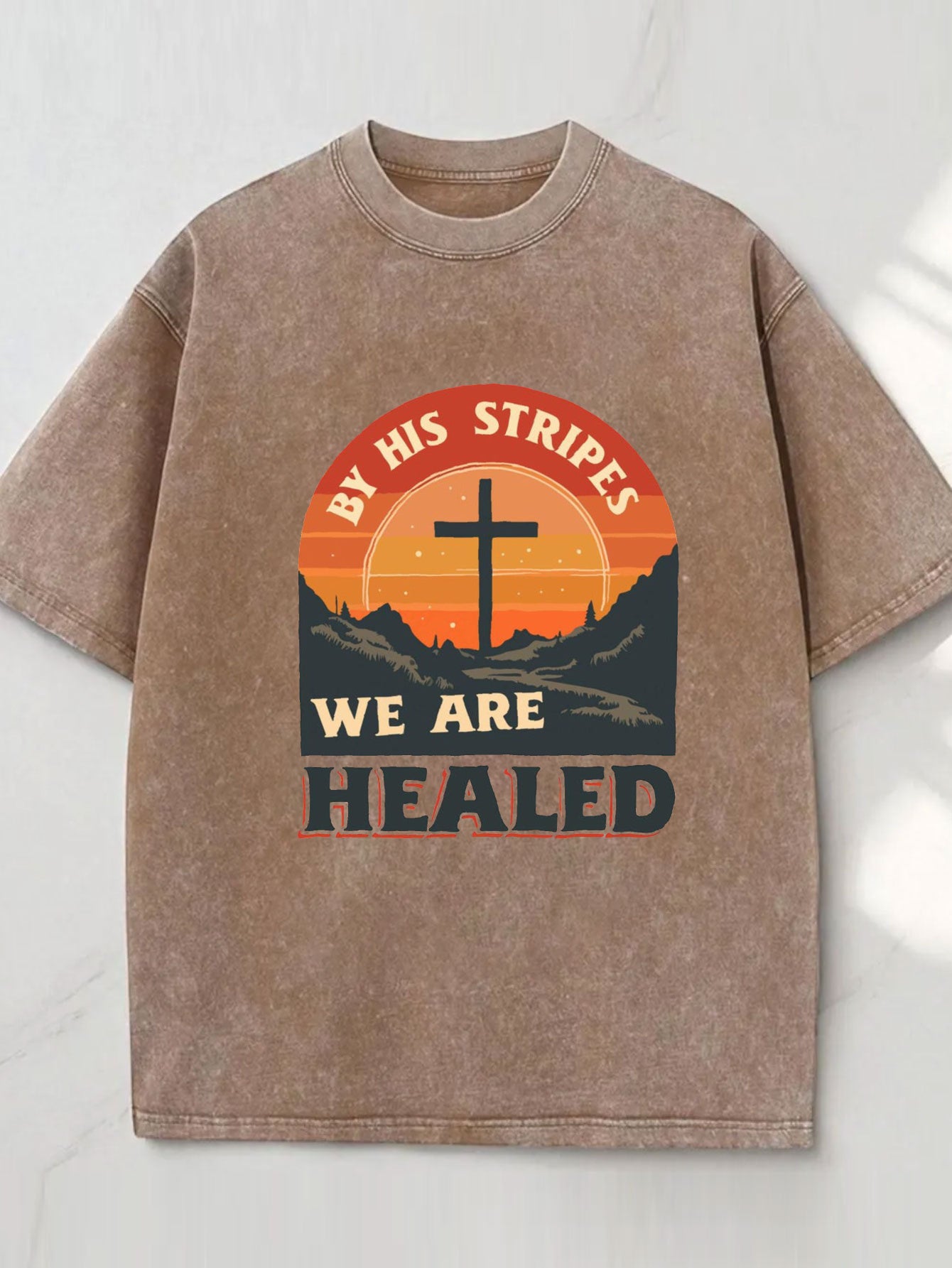 Local Delivery Vintage Loose, Washed Black Cross Sunset Print Pattern with Text 'Because of His Scourge We Are Healed', Suitable for Everyday Casual Scenes. Street Style, Weekend Outfit, Unique Shirt, Graphic, Breathable Material, Comfortable