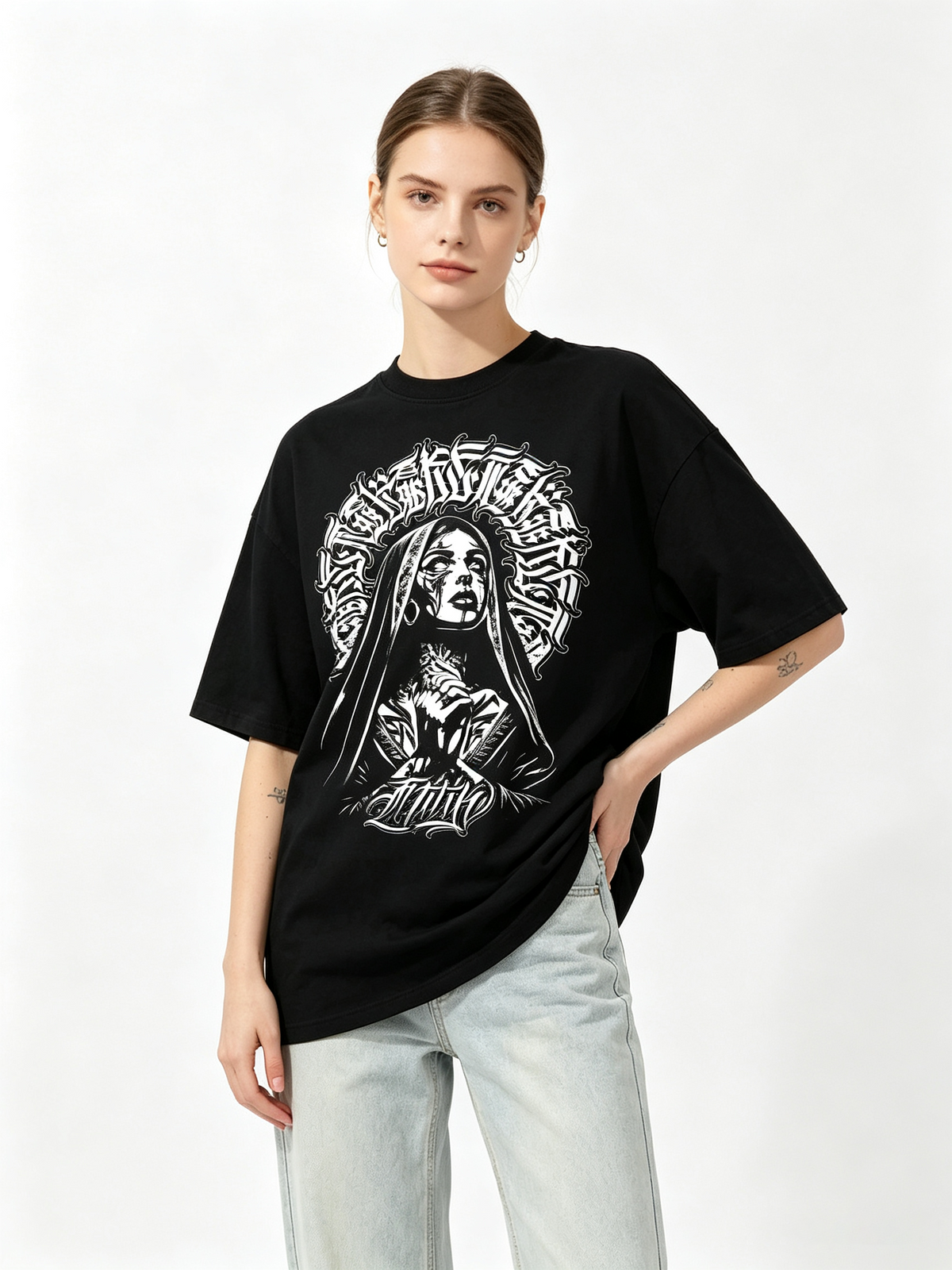 Oversized black pure cotton short-sleeve T-shirt featuring a large "Chicano-style" dark nun and Gothic lettering print on the back—an American street-style, hip-hop-inspired trendy tee for women.