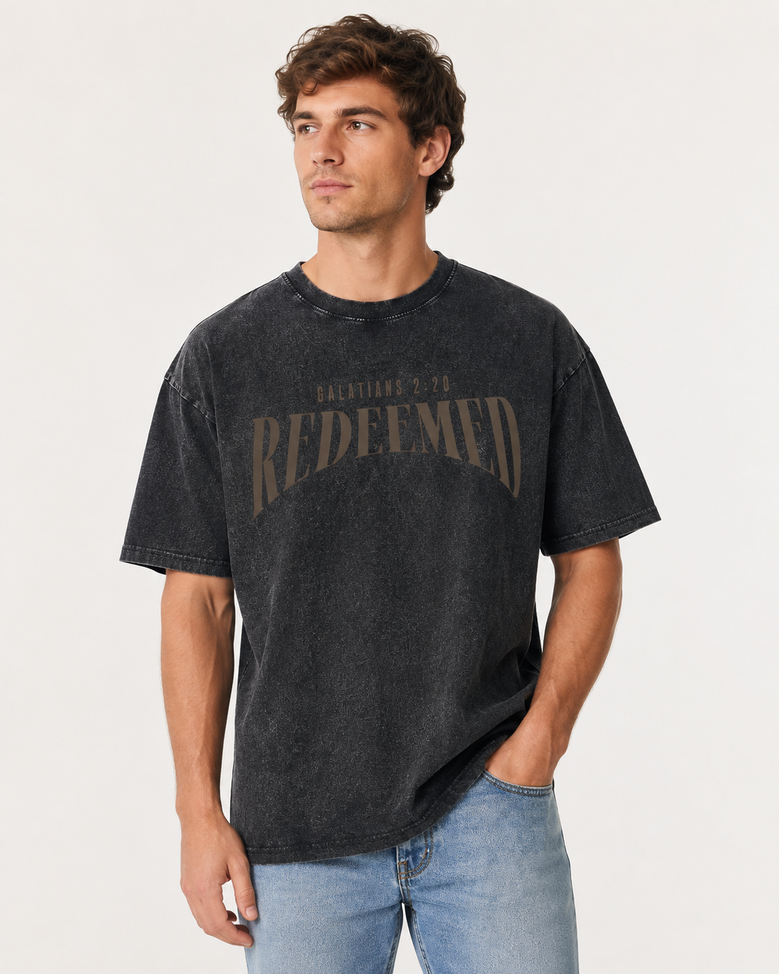 American-style acid-washed distressed short-sleeved shirt with Galatians verse and cross print on the front and back. Heavy wash, oversized, unisex religious T-shirt.
