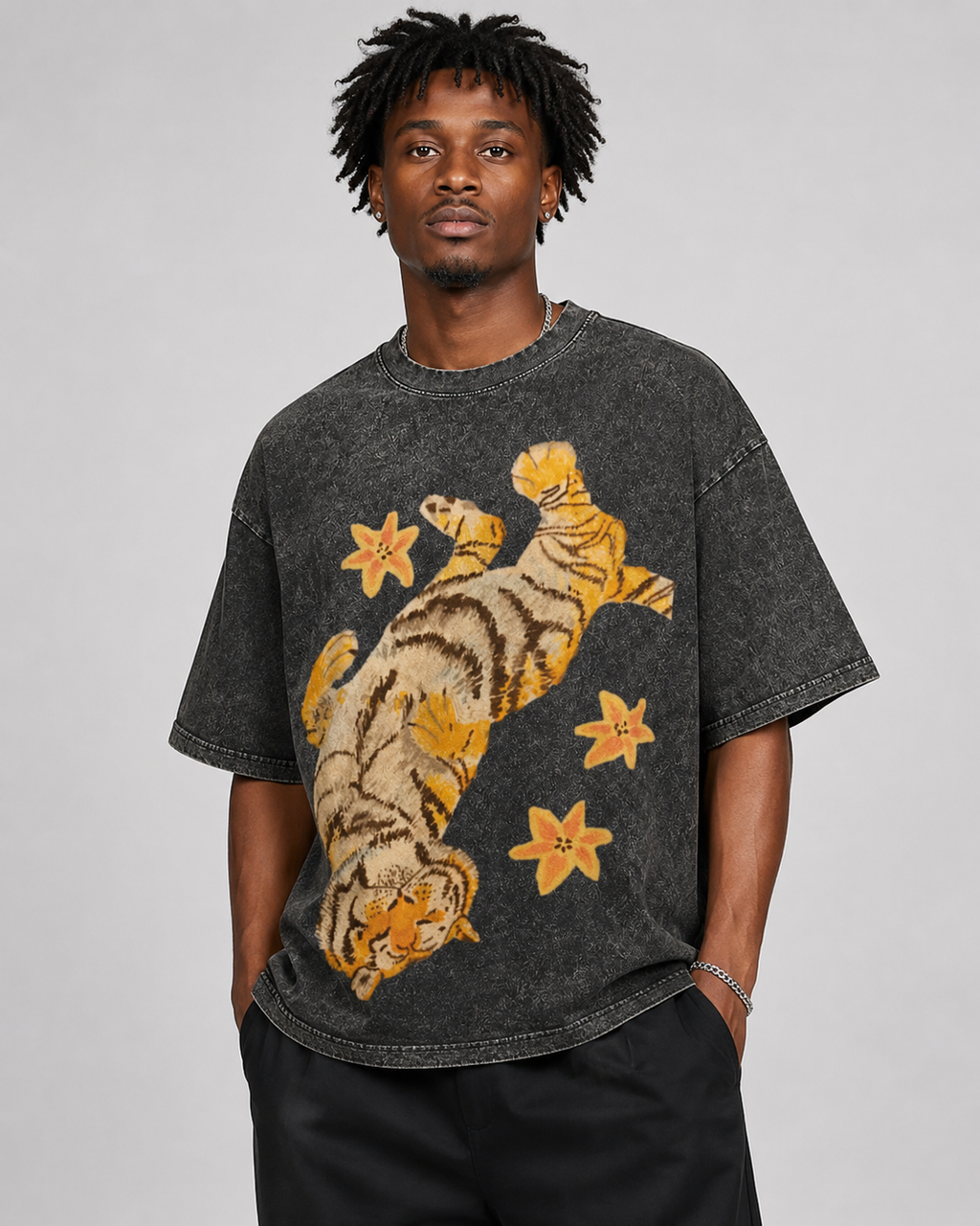 American-style acid-washed distressed, relaxed look with tiger and floral illustrations. Heavyweight vintage wash, oversized, loose fit, unisex T-shirt.