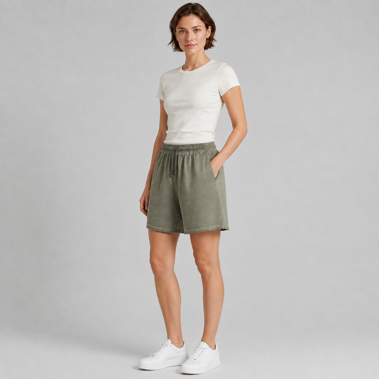 American vintage-style "dirty wash" shorts; distressed, faded, cotton-feel athletic shorts; versatile, casual unisex style.