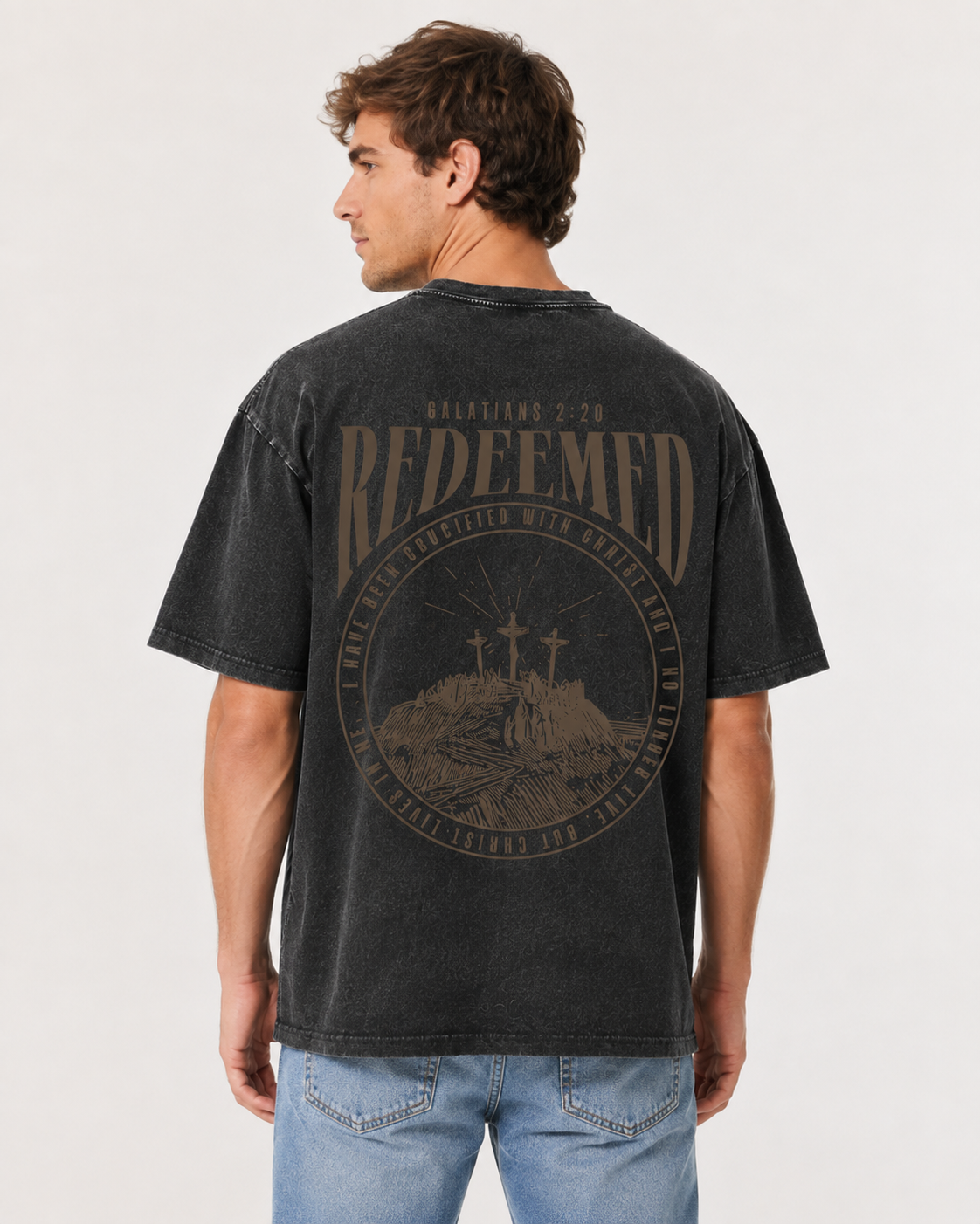 American-style acid-washed distressed short-sleeved shirt with Galatians verse and cross print on the front and back. Heavy wash, oversized, unisex religious T-shirt.
