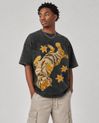 American-style acid-washed distressed, relaxed look with tiger and floral illustrations. Heavyweight vintage wash, oversized, loose fit, unisex T-shirt.