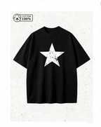 Vintage-style distressed star-print T-shirt – 100% cotton, black, oversized fit, short sleeves.