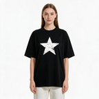 Vintage-style distressed star-print T-shirt – 100% cotton, black, oversized fit, short sleeves.