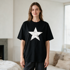 Vintage-style distressed star-print T-shirt – 100% cotton, black, oversized fit, short sleeves.