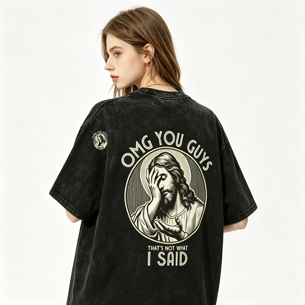 Women's American-style vintage-wash oversized drop-shoulder T-shirt featuring a playful "face-palm Jesus" graphic on the front and back.