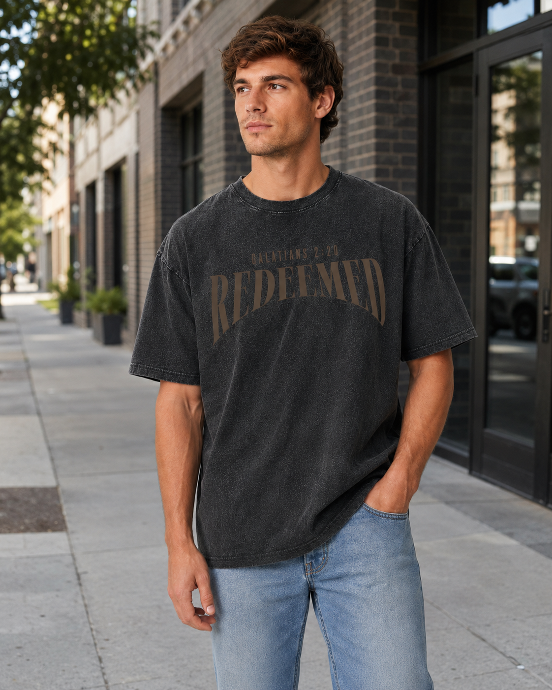 American-style acid-washed distressed short-sleeved shirt with Galatians verse and cross print on the front and back. Heavy wash, oversized, unisex religious T-shirt.