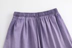 American vintage-style "dirty wash" shorts; distressed, faded, cotton-feel athletic shorts; versatile, casual unisex style.