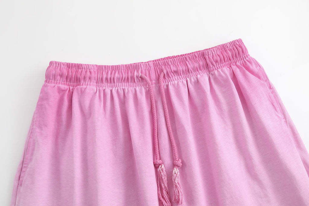 American vintage-style "dirty wash" shorts; distressed, faded, cotton-feel athletic shorts; versatile, casual unisex style.