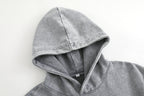 Vintage-wash distressed hooded sweatshirt—a versatile, relaxed-fit casual jacket with a laid-back, dropped-shoulder style.