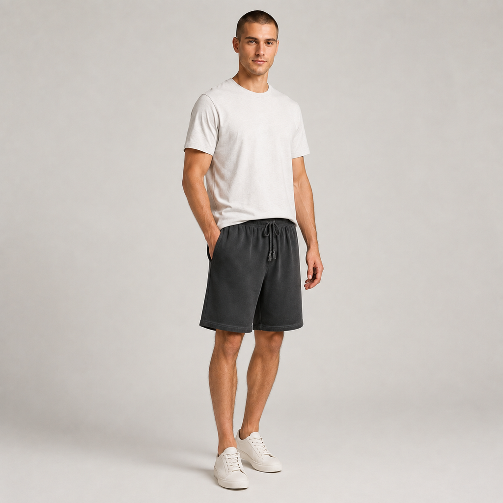 American vintage-style "dirty wash" shorts; distressed, faded, cotton-feel athletic shorts; versatile, casual unisex style.