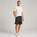 American vintage-style "dirty wash" shorts; distressed, faded, cotton-feel athletic shorts; versatile, casual unisex style.