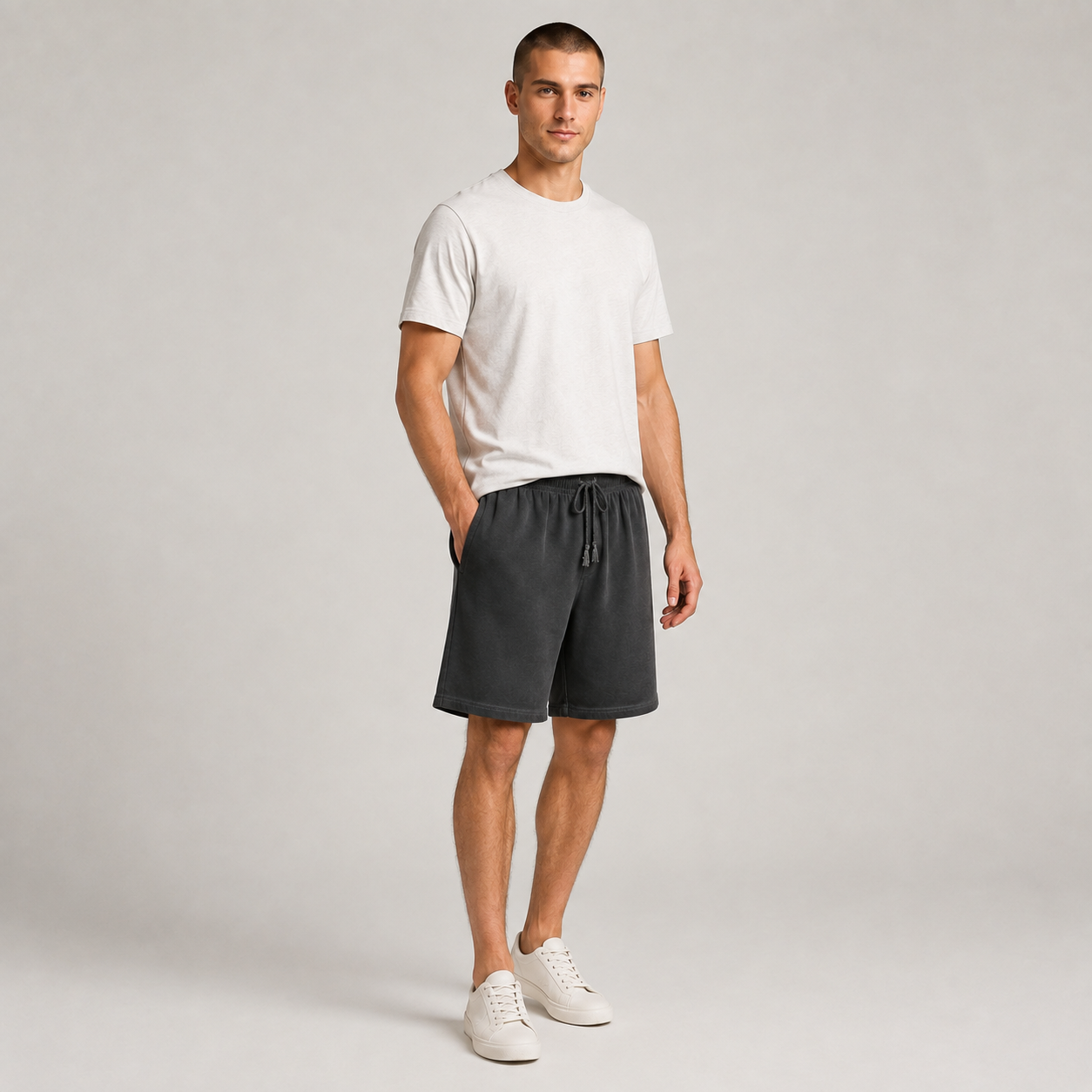 American vintage-style "dirty wash" shorts; distressed, faded, cotton-feel athletic shorts; versatile, casual unisex style.