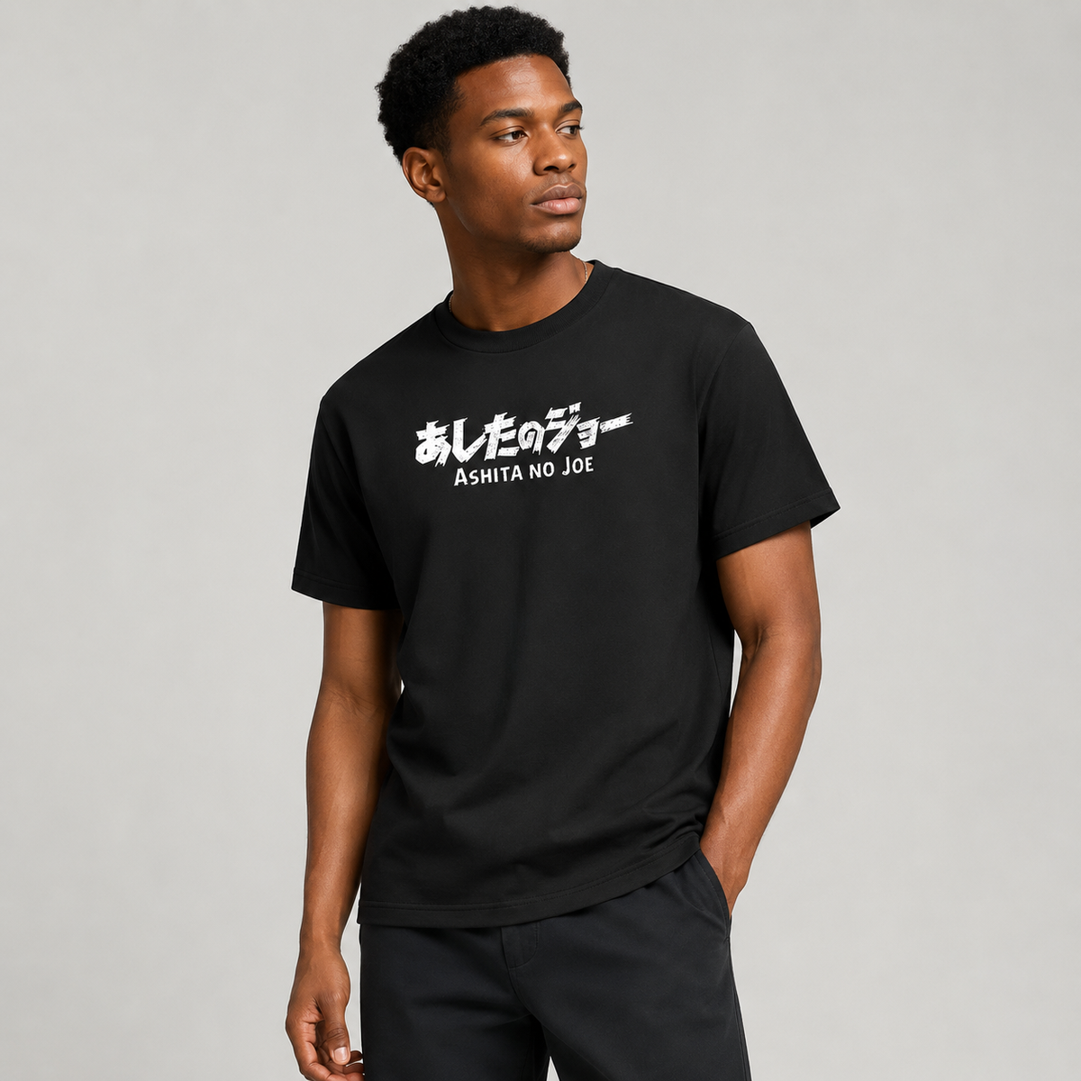 Japanese-style dark anime oversized T-shirt—distressed charcoal black, 100% cotton, featuring a large *Chainsaw Man* print and a vintage casual aesthetic.