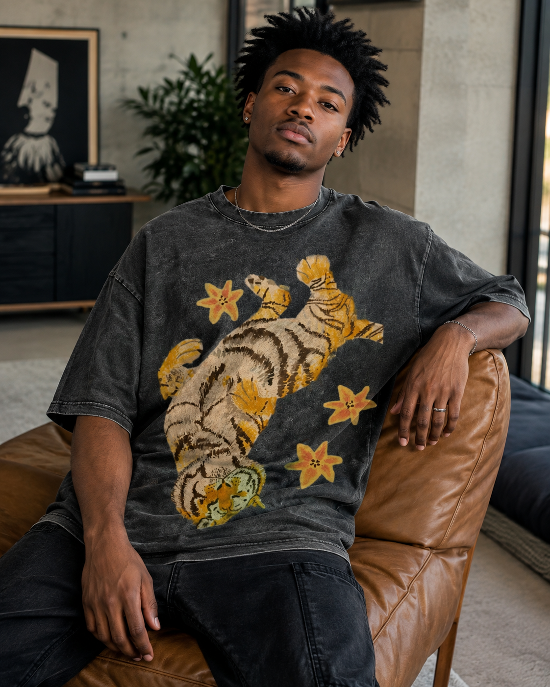 American-style acid-washed distressed, relaxed look with tiger and floral illustrations. Heavyweight vintage wash, oversized, loose fit, unisex T-shirt.