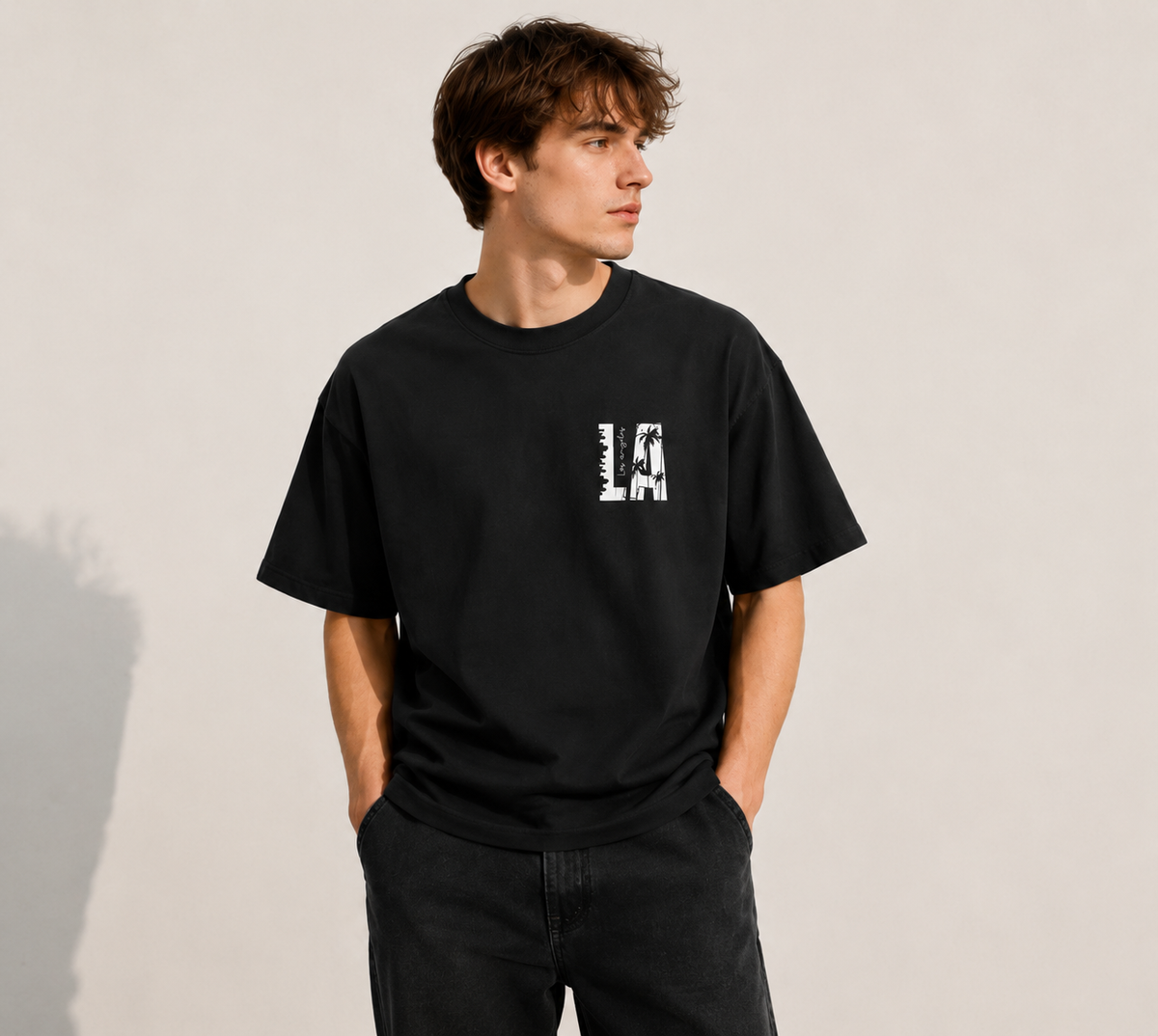 LA-themed double-sided print T-shirt with a vintage washed finish; heavyweight pure cotton, oversized loose fit; American urban streetwear style.
